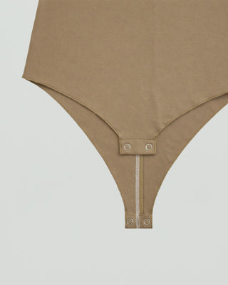 CONTRAST STITCH BODY SUIT