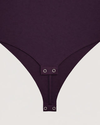 CONTRAST STITCH BODY SUIT